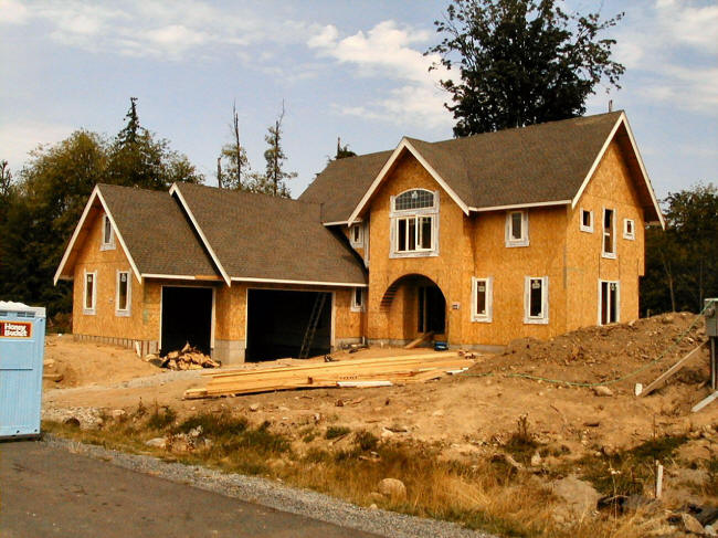 The North Residence under construction, 2004 — the framed exterior of the North family's custom home